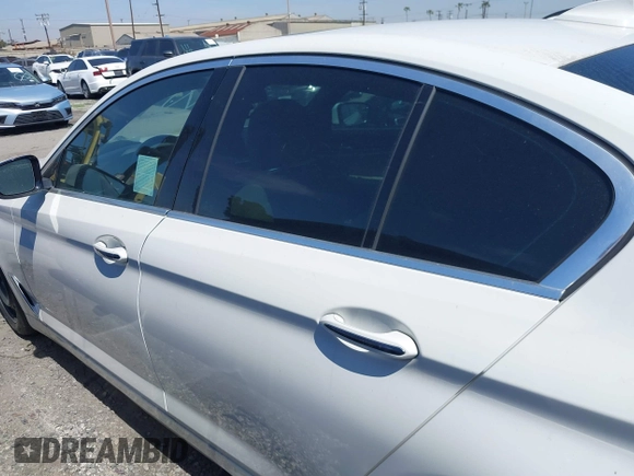 2018 BMW 5 Series 530i with VIN WBAJA5C54JWA39873, listed as a IAAI auction lot 41369709 with 66,353 mi miles and . Bid and sale history available at DreamBid. Image 14.