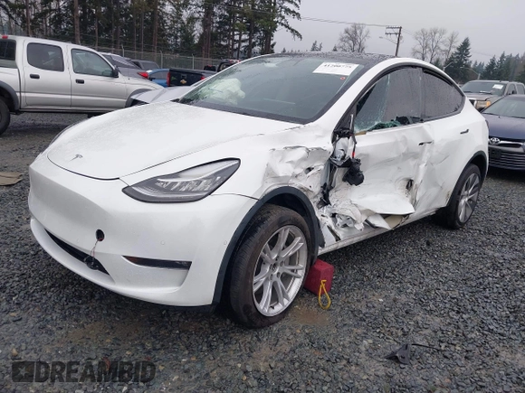 2022 Tesla Model Y Long Range z VIN 7SAYGDEE6NF451259, wystawiony jako IAAI lot #41200775 z przebiegiem 59 683 mil mil oraz . Historia ofert i sprzedaży dostępna na DreamBid. Obrazek 20.