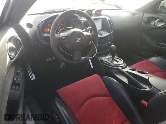 2016 Nissan 370Z z VIN JN1AZ4EH2GM935381, wystawiony jako Copart lot #83220624 z przebiegiem 56 907 mil mil oraz Szkoda całkowita • Salvage title. Historia ofert i sprzedaży dostępna na DreamBid. Obrazek 8.