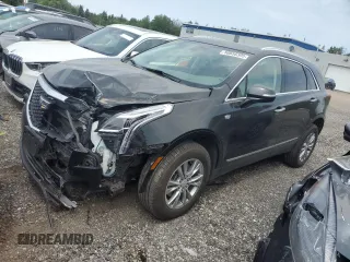 2022 Cadillac XT5 AWD Premium Luxury with VIN 1GYKNDR47NZ111097, listed as a Copart auction lot 58656395 with 70,572 mi miles and Salvage title. Bid and sale history available at DreamBid. Image 1.