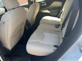 2017 Jeep Cherokee Altitude with VIN 1C4PJLABXHW628752, listed as a IAAI auction lot 42787022 with 89,002 mi miles and . Bid and sale history available at DreamBid. Image 4.