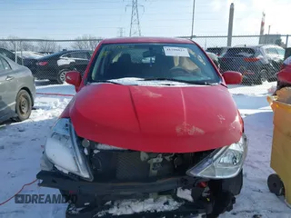 2012 Nissan Versa S with VIN 3N1BC1CP1CL361813, listed as a IAAI auction lot 41598823 with 83,026 mi miles. Bid and sale history available at carsss.com. Image 12.
