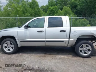 2007 Dodge Dakota SLT z VIN 1D7HE48K27S127788, wystawiony jako IAAI lot #42311626 z przebiegiem 357 130 mil mil oraz . Historia ofert i sprzedaży dostępna na DreamBid. Obrazek 15.