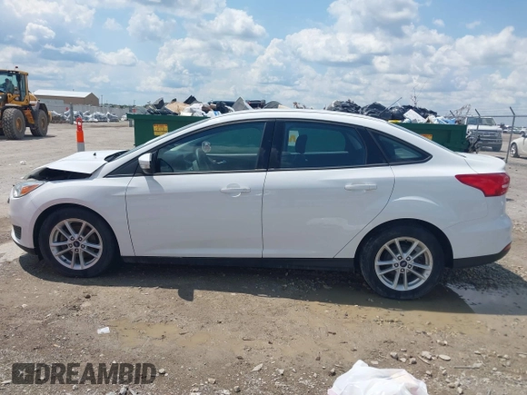 2016 Ford Focus SE z VIN 1FADP3F29GL346196, wystawiony jako IAAI lot #42171014 z przebiegiem 80 913 mil mil oraz . Historia ofert i sprzedaży dostępna na DreamBid. Obrazek 14.