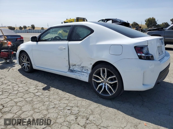 2014 Scion tC z VIN JTKJF5C71E3082375, wystawiony jako Copart lot #56909095 z przebiegiem 140 165 mil mil oraz Szkoda całkowita • Salvage title. Historia ofert i sprzedaży dostępna na DreamBid. Obrazek 2.