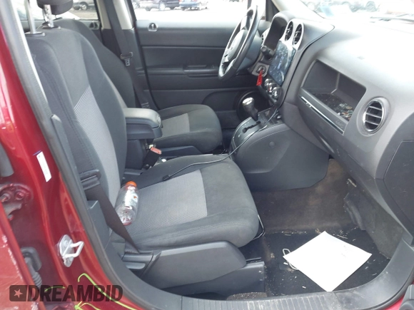 2014 Jeep Patriot Latitude with VIN 1C4NJRFB4ED897890, listed as a IAAI auction lot 41978399 with 76,688 mi miles. Bid and sale history available at carsss.com. Image 5.