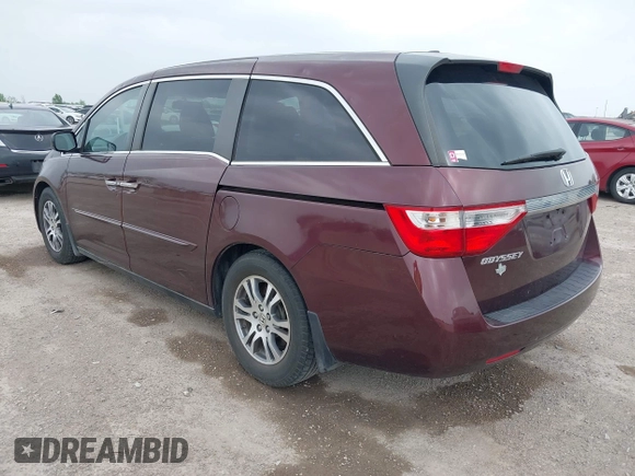 2012 Honda Odyssey EX-L with VIN 5FNRL5H61CB108301, listed as a IAAI auction lot 41939536 with 225,476 mi miles and . Bid and sale history available at DreamBid. Image 3.