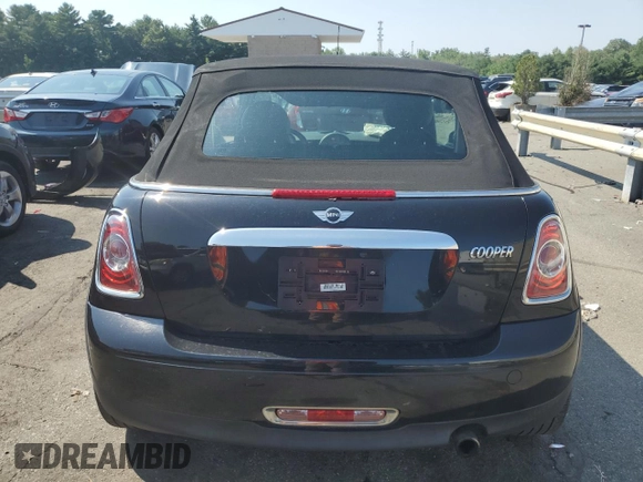 2013 MINI Convertible z VIN WMWZN3C54DT568237, wystawiony jako Copart lot #72354594 z przebiegiem 141 058 mil mil oraz Szkoda całkowita • Salvage title. Historia ofert i sprzedaży dostępna na DreamBid. Obrazek 6.
