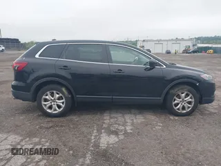 2013 Mazda CX-9 Touring z VIN JM3TB3CV4D0421734, wystawiony jako IAAI lot #42198678 z przebiegiem 131 063 mil mil oraz . Historia ofert i sprzedaży dostępna na DreamBid. Obrazek 13.