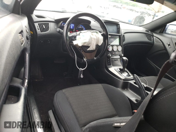 2014 Hyundai Genesis Coupe 2.0T z VIN KMHHT6KD1EU114887, wystawiony jako Copart lot #52775804 z przebiegiem 76 891 mil mil oraz Szkoda całkowita • Salvage title. Historia ofert i sprzedaży dostępna na DreamBid. Obrazek 8.