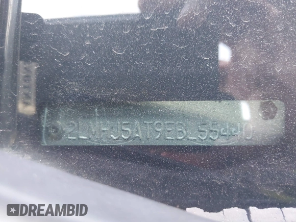 2014 Lincoln MKT EcoBoost z VIN 2LMHJ5AT9EBL55440, wystawiony jako IAAI lot #41589967 z przebiegiem 194 408 mil mil oraz . Historia ofert i sprzedaży dostępna na DreamBid. Obrazek 9.