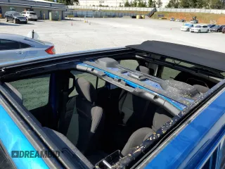 2023 Jeep Wrangler Rubicon with VIN 1C4HJXFN5PW504658, listed as a Copart auction lot 69063484 with 32,490 mi miles and Salvage title. Bid and sale history available at DreamBid. Image 12.