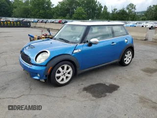 2009 MINI Hardtop S z VIN WMWMF73589TW86409, wystawiony jako Copart lot #64634865 z przebiegiem 112 646 mil mil oraz Szkoda całkowita • Salvage title. Historia ofert i sprzedaży dostępna na DreamBid. Obrazek 1.
