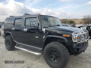2004 Hummer H2 with VIN 5GRGN23U54H118187, listed as a Copart auction lot 76258264 with 169,531 mi miles and Salvage Title. Bid and sale history available at carsss.com. Image 4.