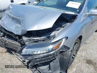 2016 Honda Accord Touring with VIN 1HGCT2B03GA000691, listed as a IAAI auction lot 42009414 with 70,306 mi miles and . Bid and sale history available at DreamBid. Image 6.
