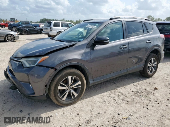 2018 Toyota RAV4 XLE with VIN 2T3WFREV2JW409292, listed as a Copart auction lot 61577355 with 189,258 mi miles and Salvage title. Bid and sale history available at DreamBid. Image 1.