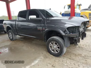 2014 Ram 2500 Laramie with VIN 3C6UR5FL3EG299600, listed as a IAAI auction lot 42399741 with 137,951 mi miles and . Bid and sale history available at DreamBid. Image 1.