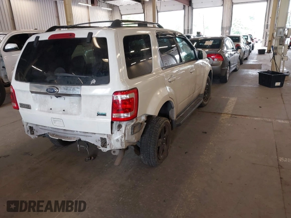 2012 Ford Escape Limited z VIN 1FMCU9EG7CKB32270, wystawiony jako IAAI lot #42238708 z przebiegiem 102 348 mil mil oraz . Historia ofert i sprzedaży dostępna na DreamBid. Obrazek 4.