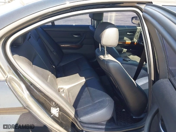 2011 BMW 3 Series 328i with VIN WBAPH7C54BE461860, listed as a IAAI auction lot 42011456 with 142,879 mi miles. Bid and sale history available at carsss.com. Image 8.