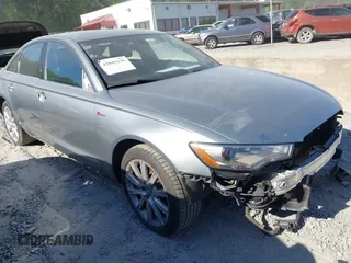 2014 Audi A6 Premium Plus with VIN WAUFGAFC2EN030685, listed as a IAAI auction lot 42045336 with 105,685 mi miles and . Bid and sale history available at DreamBid. Image 1.