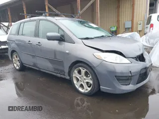 2009 Mazda 5 Touring with VIN JM1CR29L690356302, listed as a IAAI auction lot 41573737 with 127,276 mi miles. Bid and sale history available at carsss.com. Image 1.