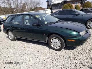1997 Saturn SW z VIN 1G8ZK8275VZ129102, wystawiony jako Copart lot #48857145 z przebiegiem 76 836 mil mil oraz Tytuł czysty. Historia ofert i sprzedaży dostępna na DreamBid. Obrazek 4.
