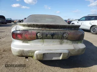 1999 Pontiac Firebird Firebird z VIN 2G2FS22K7X2214737, wystawiony jako Copart lot #77784414 z przebiegiem 93 670 mil mil oraz Czysty tytuł • Clean title. Historia ofert i sprzedaży dostępna na DreamBid. Obrazek 6.