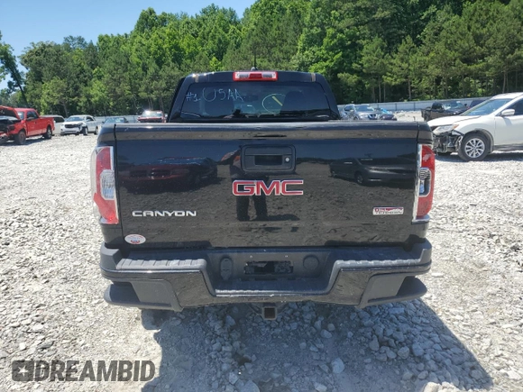 2015 GMC Canyon 4WD SLE with VIN 1GTG6BE32F1115990, listed as a Copart auction lot 71295314 with 118,913 mi miles and Salvage Title. Bid and sale history available at carsss.com. Image 12.