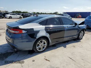 2018 Ford Fusion SE z VIN 3FA6P0HD7JR180095, wystawiony jako Copart lot #55980745 z przebiegiem 76 994 mil mil oraz Czysty tytuł • Clean title. Historia ofert i sprzedaży dostępna na DreamBid. Obrazek 3.