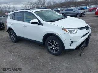 2018 Toyota RAV4 XLE with VIN JTMRFREVXJJ235208, listed as a IAAI auction lot 41810605 with 101,907 mi miles. Bid and sale history available at carsss.com. Image 1.