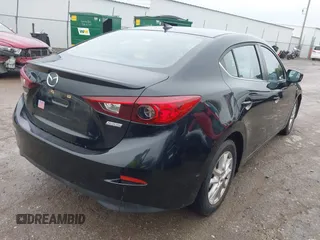 2015 Mazda 3 i Grand Touring with VIN JM1BM1W74F1251498, listed as a IAAI auction lot 40780150 with 114,087 mi miles and . Bid and sale history available at DreamBid. Image 4.