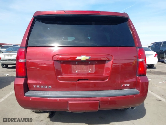 2018 Chevrolet Tahoe LT with VIN 1GNSKBKC0JR213007, listed as a IAAI auction lot 41613263 with 137,537 mi miles. Bid and sale history available at carsss.com. Image 16.