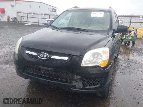 2009 Kia Sportage LX with VIN KNDJE723497612745, listed as a IAAI auction lot 41974301 with 141,110 mi miles and . Bid and sale history available at carsss.com. Image 6.