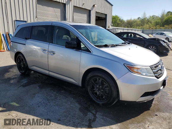 2013 Honda Odyssey EX-L with VIN 5FNRL5H69DB080586, listed as a Copart auction lot 52103685 with 166,643 mi miles and Salvage Title. Bid and sale history available at carsss.com. Image 4.