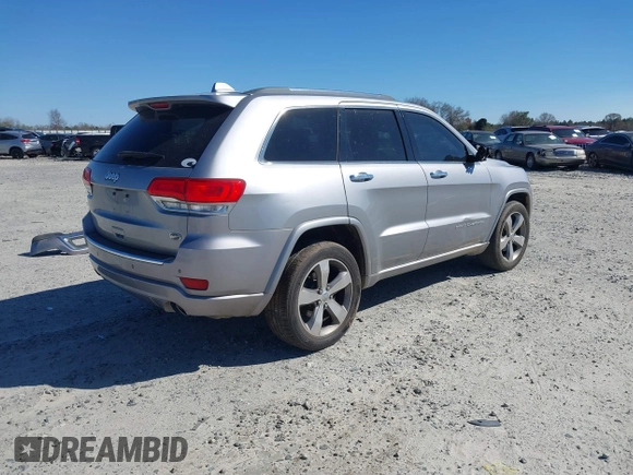 2014 Jeep Grand Cherokee Overland with VIN 1C4RJECG9EC206787, listed as a IAAI auction lot 41730875 with 194,196 mi miles. Bid and sale history available at carsss.com. Image 4.