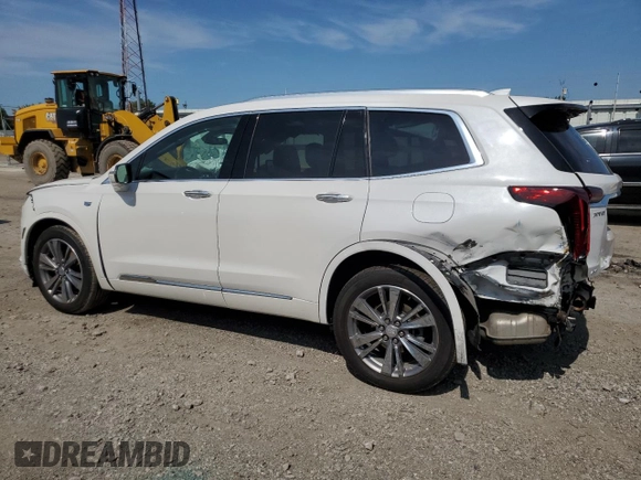 2022 Cadillac XT6 Premium Luxury with VIN 1GYKPDRS7NZ114056, listed as a Copart auction lot 66507104 with 21,989 mi miles and Clean Title. Bid and sale history available at carsss.com. Image 2.