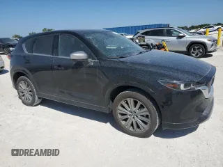 2024 Mazda CX-5 2.5 Turbo Signature with VIN JM3KFBXY2R0354346, listed as a Copart auction lot 49260525 with 9,571 mi miles and Salvage Title. Bid and sale history available at carsss.com. Image 4.