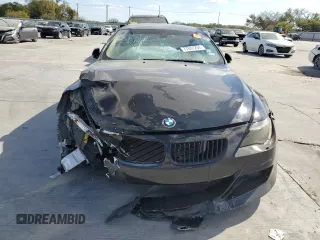 2005 BMW 6 Series 645Ci with VIN WBAEH73455B193907, listed as a Copart auction lot 77631234 with 0 mi miles and Salvage Title. Bid and sale history available at carsss.com. Image 5.