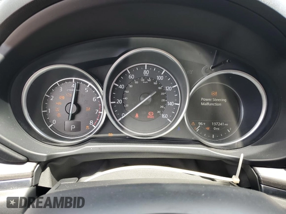 2018 Mazda CX-5 Grand Touring с VIN JM3KFBDM0J0362967, выставлен на аукционе Copart как лот 60288665 с пробегом 137 241 миль миль и Списание • Salvage title. История ставок и продаж доступна на DreamBid. Изображение 9.