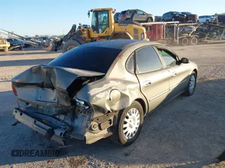 2003 Ford Taurus LX Standard with VIN 1FAFP52U33A235063, listed as a IAAI auction lot 41777293 with 164,125 mi miles and . Bid and sale history available at DreamBid. Image 4.