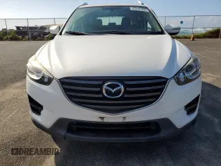 2016 Mazda CX-5 Sport с VIN JM3KE2BY0G0874729, выставлен на аукционе Copart как лот 45242795 с пробегом 70 741 миль миль и Чистый • Clean title. История ставок и продаж доступна на DreamBid. Изображение 5.