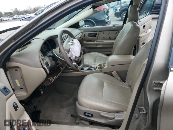 2004 Mercury Sable LS Premium с VIN 1MEFM55SX4A607611, выставлен на аукционе Copart как лот 52889395 с пробегом Не указан миль и Списание • Salvage title. История ставок и продаж доступна на DreamBid. Изображение 7.