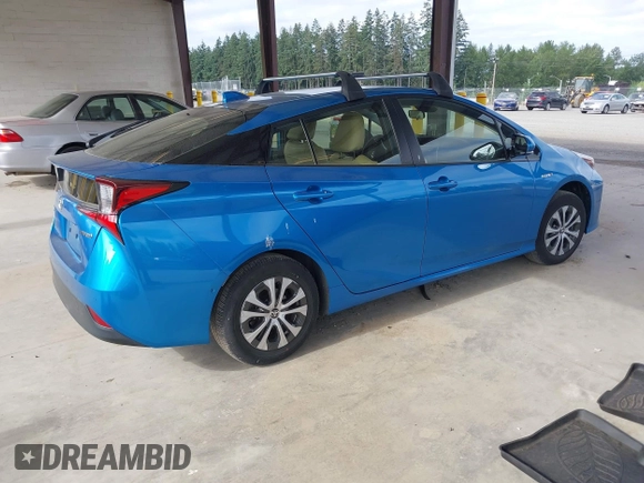 2020 Toyota Prius LE with VIN JTDL9RFU5L3018787, listed as a IAAI auction lot 42723431 with 30,793 mi miles and . Bid and sale history available at DreamBid. Image 4.