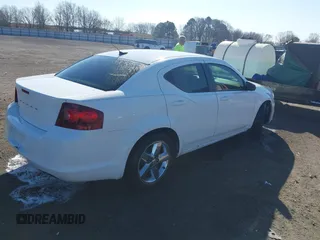 2014 Dodge Avenger SE z VIN 1C3CDZAB1EN116800, wystawiony jako IAAI lot #41668822 z przebiegiem 190 583 mil mil oraz . Historia ofert i sprzedaży dostępna na DreamBid. Obrazek 4.