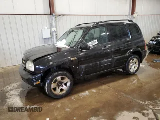 2000 Suzuki Grand Vitara JLX z VIN JS3TD62V1Y4113961, wystawiony jako Copart lot #41488995 z przebiegiem 212 541 mil mil oraz Szkoda całkowita • Salvage title. Historia ofert i sprzedaży dostępna na DreamBid. Obrazek 1.