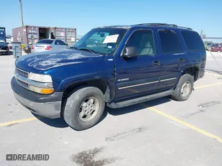 2001 Chevrolet Tahoe LT with VIN 1GNEC13T71J184865, listed as a IAAI auction lot 41799799 with 290,196 mi miles. Bid and sale history available at carsss.com. Image 2.