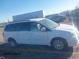 2015 Chrysler Town & Country LX with VIN 2C4RC1AG1FR678142, listed as a IAAI auction lot 41016680 with 78,756 mi miles and . Bid and sale history available at carsss.com. Image 13.
