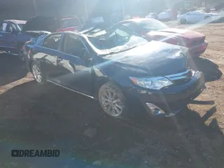 2012 Toyota Camry XLE z VIN 4T1BD1FK5CU061039, wystawiony jako IAAI lot #41357985 z przebiegiem 76 493 mil mil oraz . Historia ofert i sprzedaży dostępna na DreamBid. Obrazek 1.