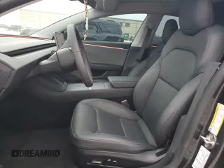 2024 Tesla Model 3 with VIN 5YJ3E1EA0RF861070, listed as a Copart auction lot 51486835 with 6,917 mi miles and Salvage Title. Bid and sale history available at DreamBid. Image 7.
