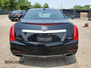 2014 Cadillac CTS Luxury AWD with VIN 1G6AX5SXXE0120681, listed as a Copart auction lot 60076655 with 99,552 mi miles and Salvage title. Bid and sale history available at DreamBid. Image 6.